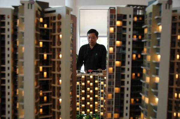 年末房产市场仍然低位运行,有不少企业无法完成全年目标。 视觉中国 图